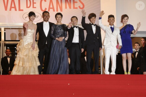 Le casting d'A Touch of Sin en haut de la montée des marches du Palais des Festivals à Cannes, le 17 mai 2013.
