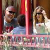 Christian Audigier et sa petite amie Nathalie Sorensen prennent du bon temps autour de plats mexicains avec Rocco, fils du styliste, le 21 mai 2013.