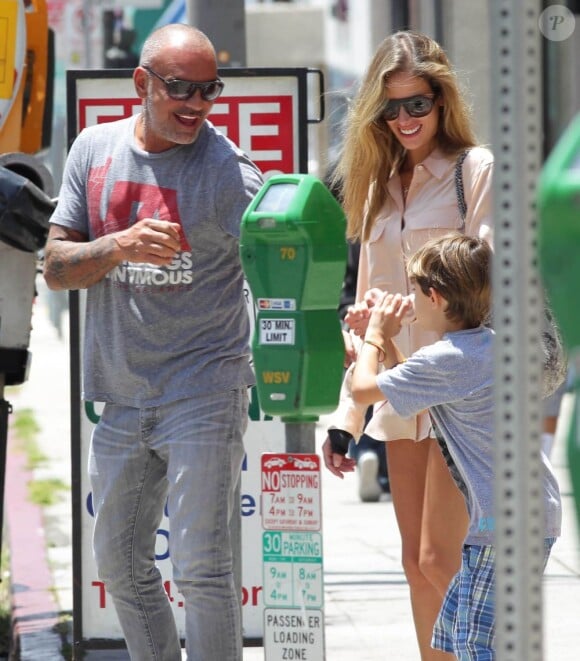Christian Audigier, son fils Rocco et sa petite amie Nathalie Sorensen à Santa Monica, le 21 mai 2013.
