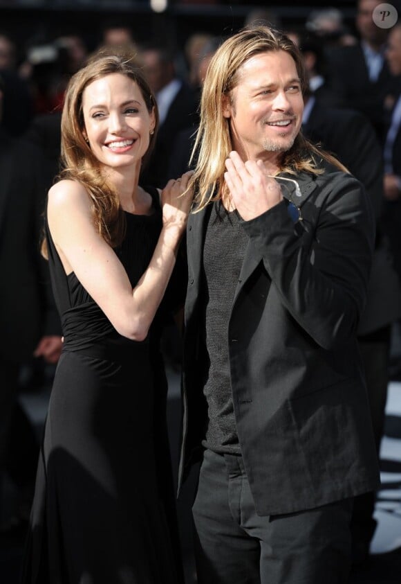Brad Pitt et Angelina Jolie radieux à la première mondiale de World War Z, à l'Empire Leicester Square, Londres, le 2 juin 2013.