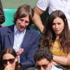 Olivia Ruiz et un ami à Roland-Garros le 3 juin 2013.