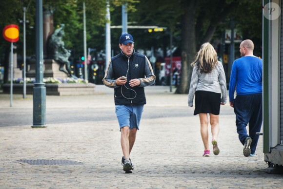 Chris O'Neill en promenade matinale à Stockholm, le 7 juin 2013, à la veille de son mariage avec la princesse Madeleine.
