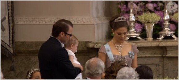 Chris O'Neill et la princesse Madeleine de Suède au moment de l'échange des consentements, lors de leur mariage en la chapelle du palais royal à Stockholm le 8 juin 2013.