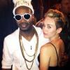 Miley Cyrus et le rappeur Juicy J lors de son concert à la House of Blues. Los Angeles, le 8 juin 2013.