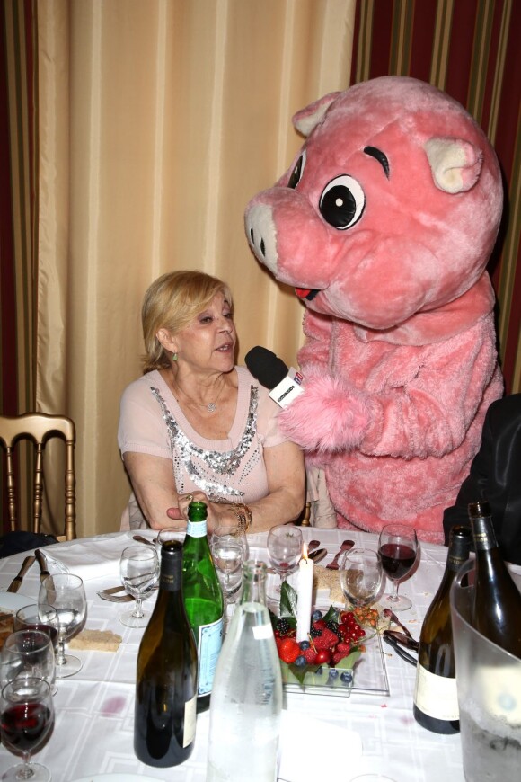 Nicoletta et Christophe Beaugrand déguisé en cochon à la soirée "La charcuterie fait son show" au Chalet du Lac à Paris le 10 juin 2013.