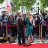 Julie Gayet et Olivier Martinez lors de la soirée d'ouverture du Champs-Elysées Film Festival et la présentation du film Struck, au cinéma Publicis à Paris le 12 juin 2013