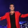 Robbie Williams sur la scène du Wembley Stadium lors de l'événement Capital FM's Summertime Ball à Londres, le 9 juin 2013.