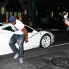 Justin Bieber au volant de sa Ferrari, accompagné de son ami Lil Twist, quitte le club Laugh Factory à Los Angeles, le 17 juin 2013. Il a heurté un photographe mais a été blanchi par la police.