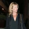 Kate Moss, ultrachic en noir avec des souliers Christian Louboutin à la sortie du club Loulou's à Londres, le 18 juin 2013.