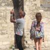 Christian Audigier de retour dans sa ville natale d'Avignon où il a joué les touristes en compagnie de sa belle Nathalie Sorensen devant le pont d'Avignon le 17 juin 2013