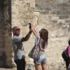 Christian Audigier de retour dans sa ville natale d'Avignon où il a joué les touristes en compagnie de sa belle Nathalie Sorensen devant le pont d'Avignon le 17 juin 2013