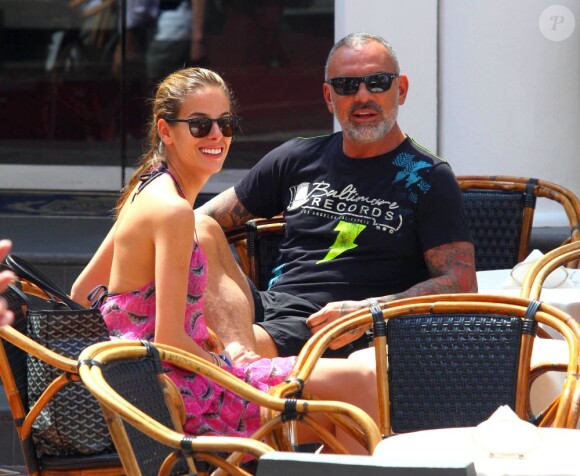 Le créateur français Christian Audigier et sa fiancée Nathalie Sorensen heureux lors d'un week-end romantique à Capri en Italie, le 21 juin 2013.