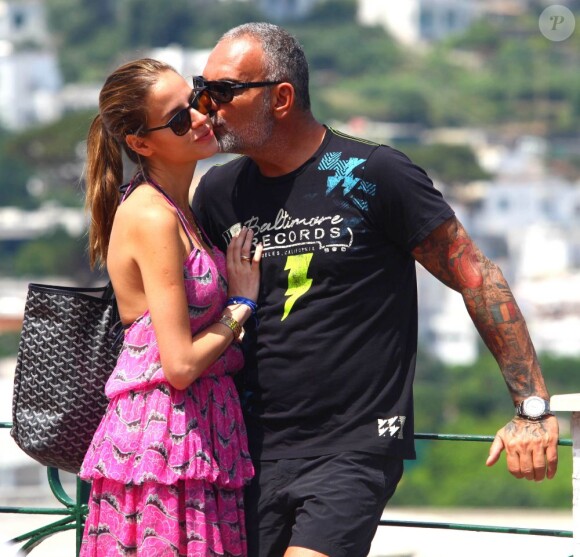 Christian Audigier et sa fiancée Nathalie Sorensen heureux lors d'un week-end romantique à Capri en Italie, le 21 juin 2013.