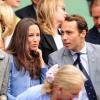 Pippa et James Middleton assistent depuis la loge royale à la première journée de Wimbledon  au All England Lawn Tennis and Croquet Club de Londres le 24 juin 2013