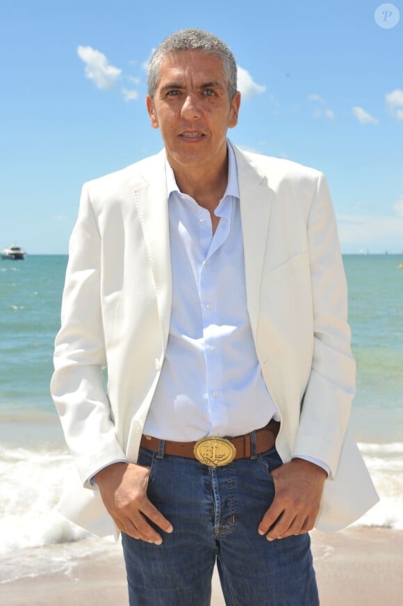 L'acteur Samy Naceri pose au photocall de Tip Top sur la Terrazza Martini à Cannes, le 19 mai 2013.
