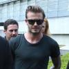 David Beckham quitte le parc André Citroën après avoir assisté au défilé Louis Vuitton. Paris, le 27 juin 2013.