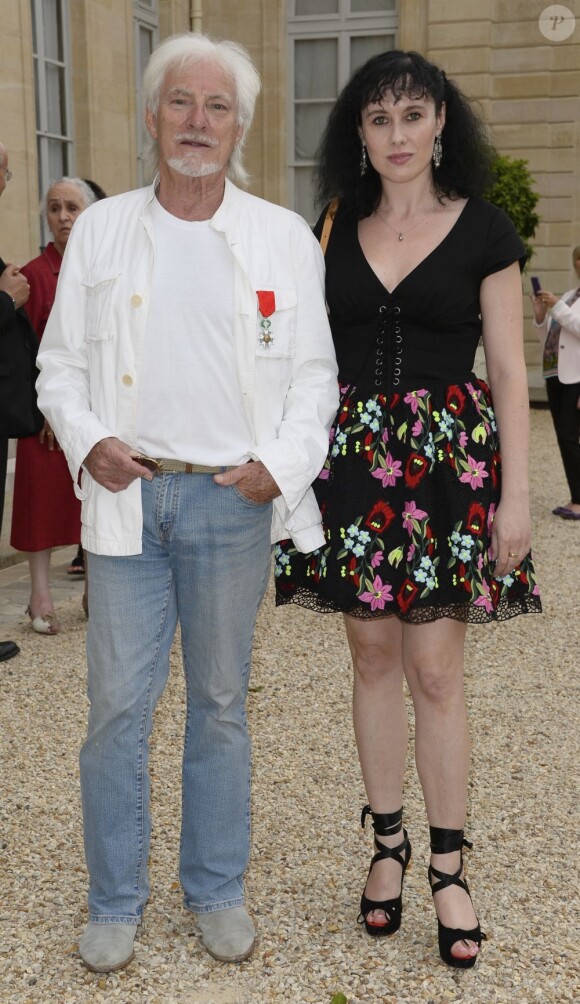 Hugues Aufray et sa compagne Muriel - Hugues Aufray a été fait Chevalier de la Légion d'Honneur au palais de l'Élysée à Paris le 2 juillet 2013.