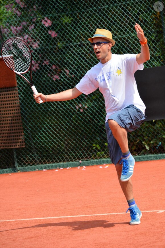 French singer Marc Fichel participates in a celebrity charity tennis tournament to benefit French association 'Enfant Star et Match', in Antibes, southern France on July 10, 2013. Photo by Patrice Masante/ABACAPRESS.COM10/07/2013 - Antibes