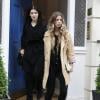 Nigella Lawson et sa fille Cosina à la sortie de son bureau à Londres. Le 21 juin 2013.