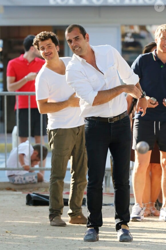 David Marouani et Cédric Pioline lors du tournoi de pétanque organisé à l'occasion de la 3ème édition du Classic Tennis Tour, sur la place des Lices à Saint-Tropez le 11 juillet 2013