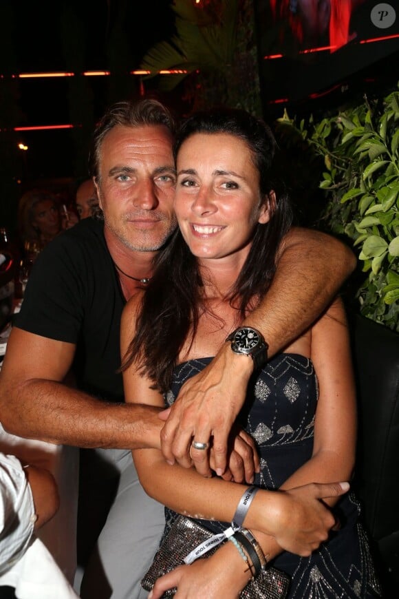 David Ginola et Caroline Bîmes lors de la soirée au VIP Room de Saint-Tropez qui rassemblait les participants du Classic Tennis Tour, le 12 juillet 2013