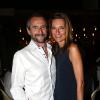 Jean-Claude Blanc, directeur sportif du PSG et sa femme lors de la soirée au VIP Room de Saint-Tropez qui rassemblait les participants du Classic Tennis Tour, le 12 juillet 2013
