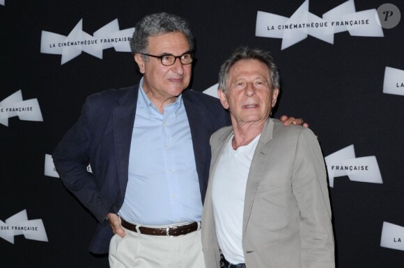 Serge Toubiana et Roman Polanski à la projection du film Weekend of a Champion à la Cinémathèque française, Paris, le 16 juillet 2013.