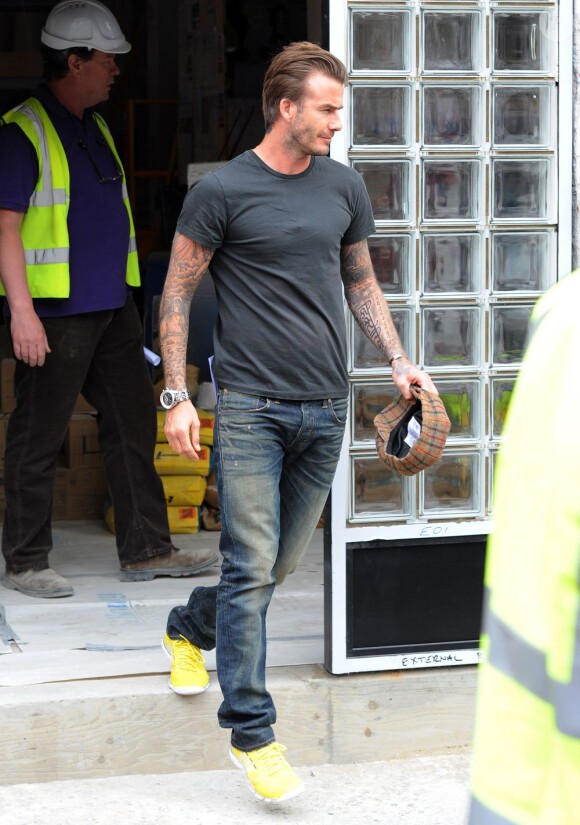 Exclusif - David et Victoria Beckham, quittent un site de construction dans le sud de Londres avec leur ami Gordon Ramsay, le 12 juillet 2013. Il se pourrait que les Beckham aient décidé d'investir dans un restaurant.
