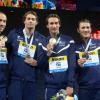 Camille Lacourt, Jérémy Stravius, Fabien Gilot et Giacomo Perez Dortona, champion du monde du 4x100 m 4 nages au Palau Sant Jordi de Barcelone