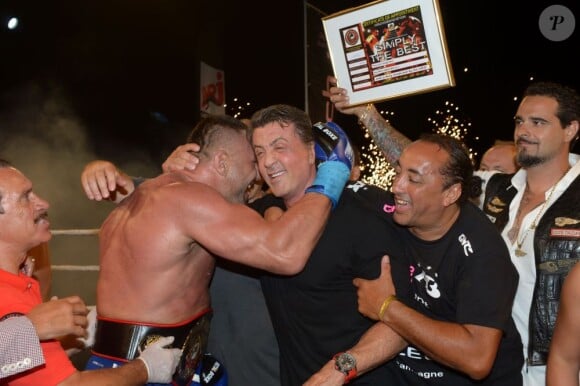 Jérôme Le Banner et Sylvester Stallone lors de la soirée Fight Night au coeur de la citadelle de Saint-Tropez, le 4 août 2013