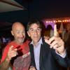 Vincent Lagaf' et Tex au restaurant La Bouillabaisse à Saint-Tropez, à l'occasion d'un dîner organisé par Marcel Campion, le mardi 6 août 2013.