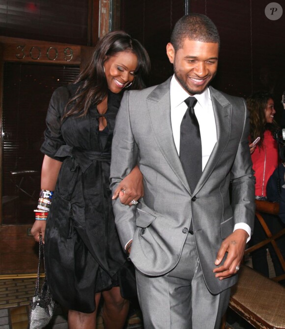 Usher et Tameka Foster quittent la fête de Victoria et David Beckham au Via Veneto de Santa Monica, Los Angeles, le 21 avril 2008.