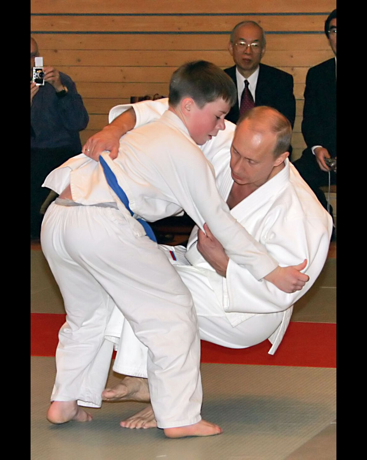 Photo : Russia's President Vladimir Putin (R) attends a master class at ...