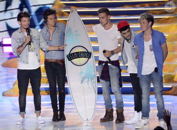(L-R) Liam Payne, Harry Styles, Louis Tomlinson, Zayn Malik and Niall Horan of One Direction accept the award for Choice Group onstage at the 2013 Teen Choice Awards at Gibson Amphitheater on Sunday, August 11, 2013, in Universal City, Los Angeles, CA, USA. Photo by Phil McCarten/PictureGroup/ABACAPRESS.COM12/08/2013 - Los Angeles