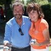 Bernard Montiel et Liane Foly lors de la 6eme édition du tournoi de pétanque Starwest dans le parc Mauresque d'Arcachon, le 11 août 2013.
