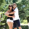 Claudia Romani et son compagnon Kevin lors de la 6eme édition du tournoi de pétanque Starwest dans le parc Mauresque d'Arcachon, le 11 août 2013.