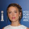 Amber Heard lors du déjeuner de l'Association hollywoodienne de la presse étrangère (HFPA) à Beverly Hills, le 13 août 2013.