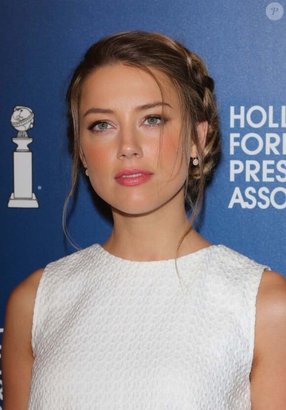 Amber Heard lors du déjeuner de l'Association hollywoodienne de la presse étrangère (HFPA) à Beverly Hills, le 13 août 2013.