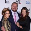 Triple H, Vanessa Hudgens et Stephanie McMahon lors de la soirée Superstars For Hope à Los Angeles, le 15 août 2013.