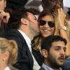 Michaël Youn et sa compagne Isabelle Funaro au Parc des Princes pour le match entre le PSG et AC Ajaccio (1-1), le 18 août 2013.