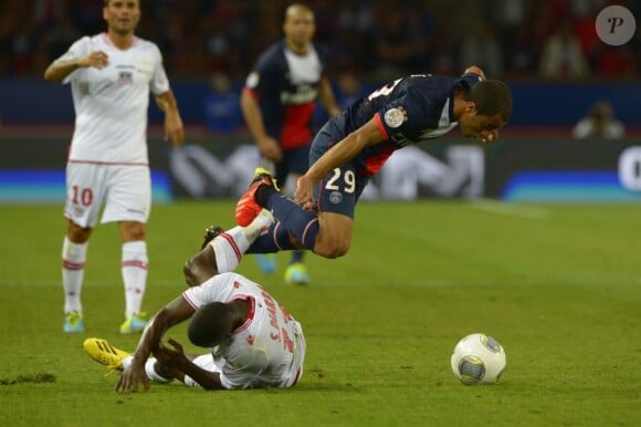 PSG's Lucas Moura battling Ajaccio's Sigamary Diarra during the French First League soccer match, PSG vs Ajaccio in Paris, France, on August 18th, 2013. PSG and Ajaccio drew 1-1 Photo by Henri Szwarc/ABACAPRESS.COM19/08/2013 - Paris