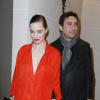 Melissa George et son compagnon Jean-David Blanc au défilé H&M au Musée Rodin, pendant la Fashion Week parisienne, le 27 février 2013. 