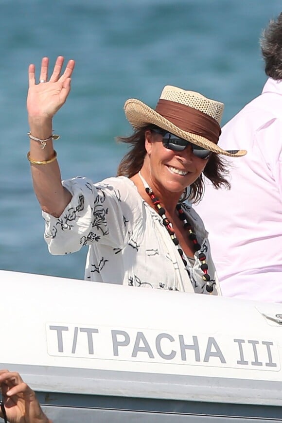 La princesse Caroline de Hanovre quitte le Club 55 à Saint-Tropez, après avoir dejeuné avec des amis., le 23 août 2013.