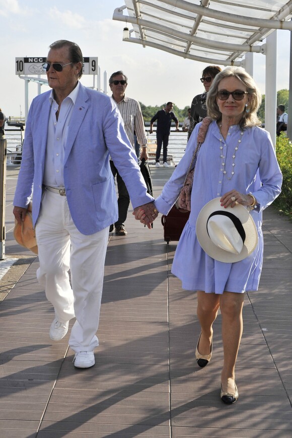 Roger Moore et sa femme Kristina Tholstrup arrivent en amoureux à Venise, le 26 août 2013.