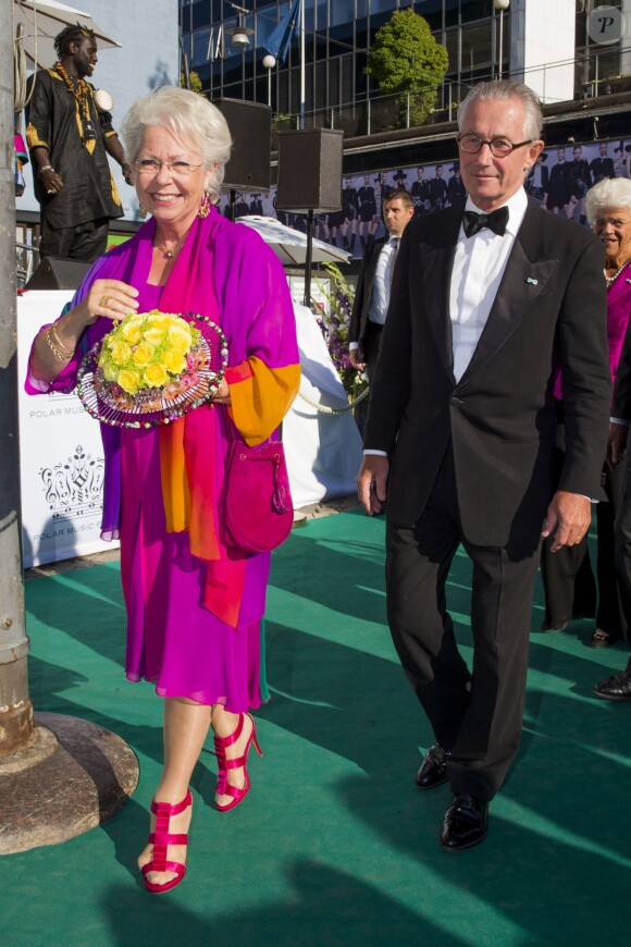 La princesse Christina et son mari Tord Magnuson à la cérémonie de remise du Polar Music Prize 2013 à Youssou N'Dour et Kaija Saariaho, le 27 août 2013 à Stockholm