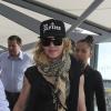 La chanteuse Madonna et ses enfants David, Mercy et Lourdes à l'aéroport de Londres. Le 3 septembre 2013. La chanteuse s'envole certainement pour New york où elle possède sa résidence principale.