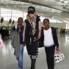 Madonna et ses enfants David, Mercy et Lourdes à l'aéroport de Londres. Le 3 septembre 2013. La chanteuse s'envole certainement pour New york où elle possède sa résidence principale.