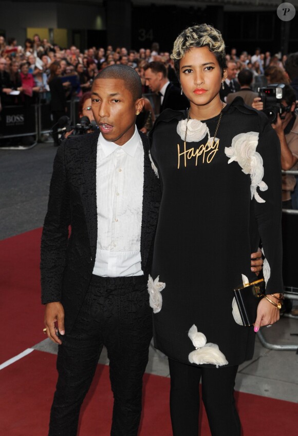 Pharrell Williams au bras de sa compagne Helen à la soirée "GQ Men of the Year Awards" à Londres le 3 septembre 2013.