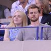 Dakota Fanning et son petit-ami Jamie Strachan lors de l'US Open le 4 septembre 2013.