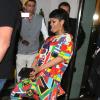 Rihanna quitte l'hôtel 45 Park Lane en mimant un acte sexuel avec son garde du corps. Une blague qui a fait sourire la star et sa victime. Londres, le 11 septembre 2013.